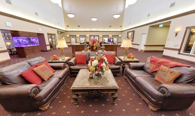 Common area with seating and floral decorations