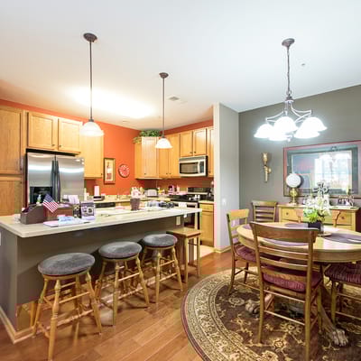 Bright common area with kitchen and dining space