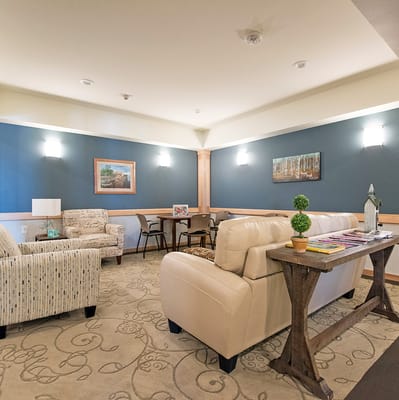 Cozy common area with seating and artwork