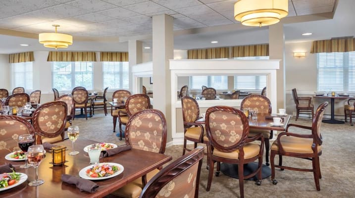 Dining room with tables set for meals