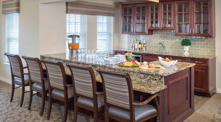 Bright dining area with food spread on the counter