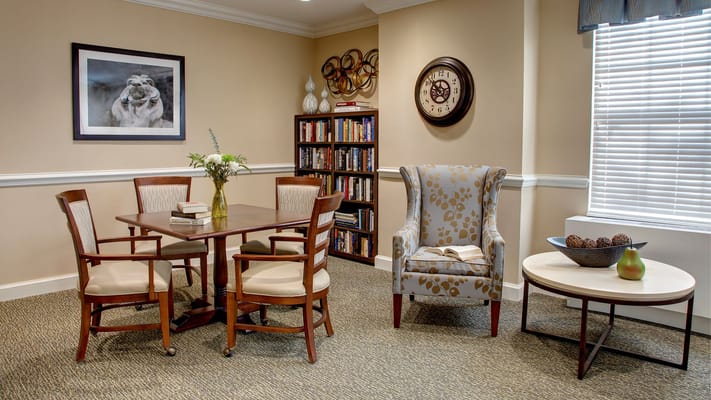 Cozy interior room with seating and shelves