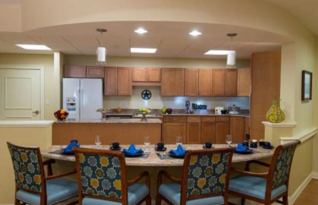 Dining area with a view of the kitchen