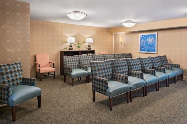 Interior waiting area with upholstered chairs