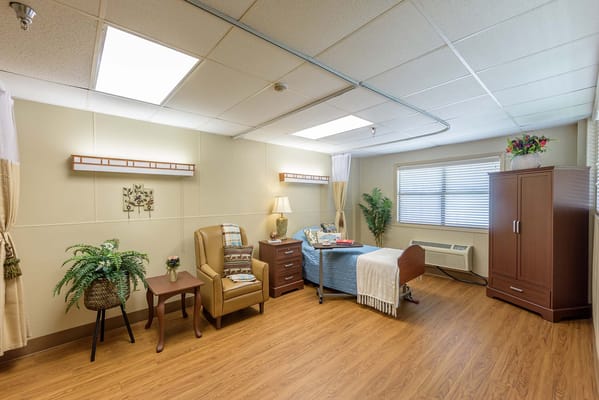 Interior view of a private resident room with decor