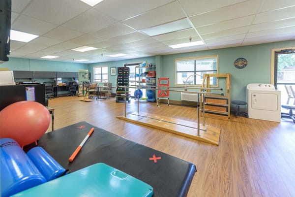 Interior view of a therapy room with equipment