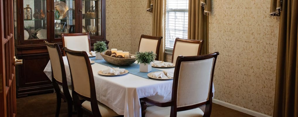 Elegant dining room setup with table and decorations