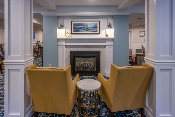 Cozy common area with seating and fireplace