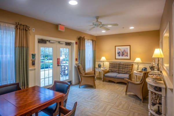 Bright common area with seating and natural light