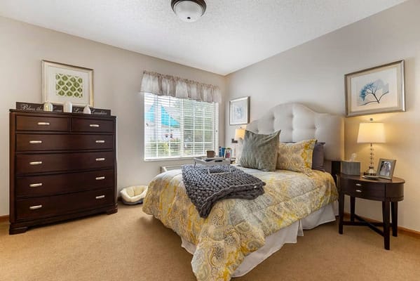 Cozy resident bedroom with light decor