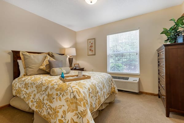 Cozy resident bedroom with floral bedding