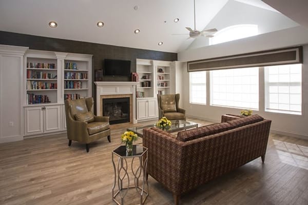Interior common area with seating and bookshelves