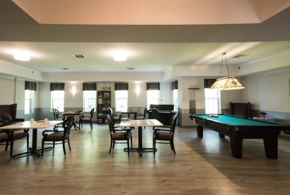 Interior common area with pool table and seating