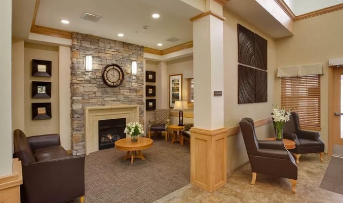 Cozy lounge area with seating and fireplace
