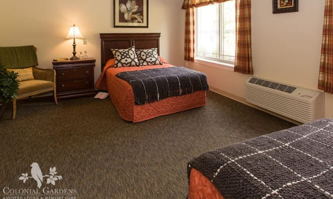 Cozy resident room with two beds and window