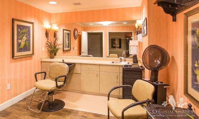 Hair salon area with styling chairs and mirrors
