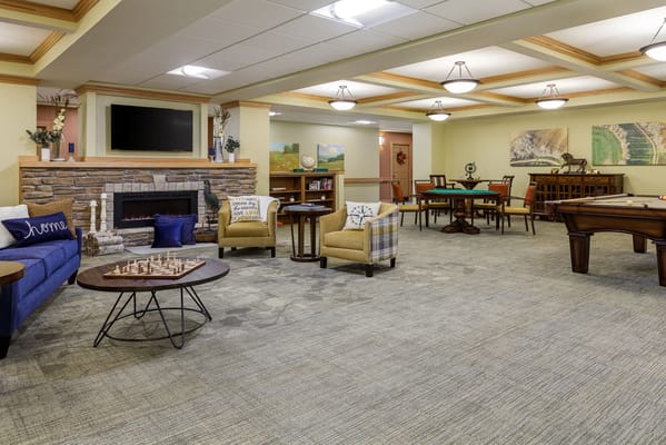 Common area with seating and game tables