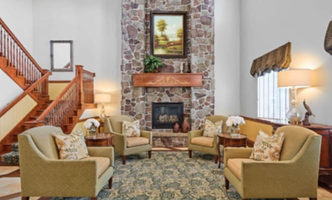 Cozy common area with seating and fireplace