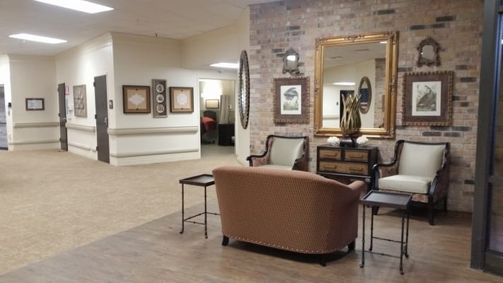 Inviting living area with seating and decorative wall art