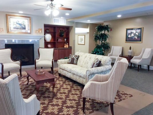 Lounge area with seating and decorative elements