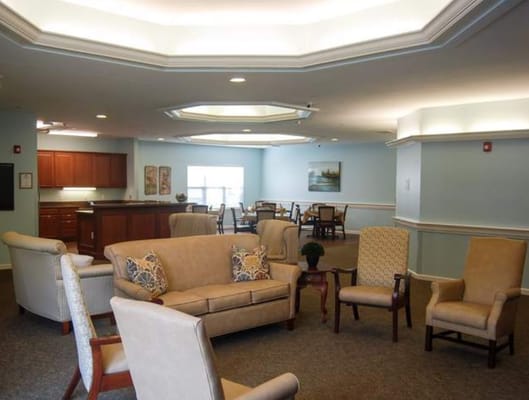 Lounge area with seating and a kitchenette