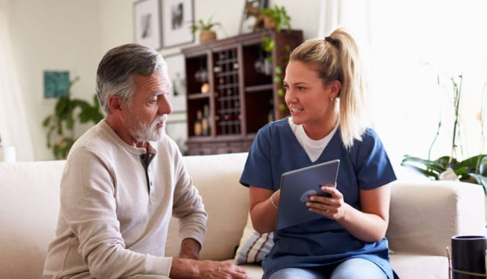 Staff member interacting with a resident during a conversation