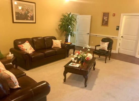 A cozy common area with seating and decor