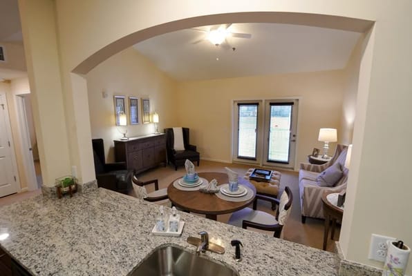 Spacious living room with seating and dining area