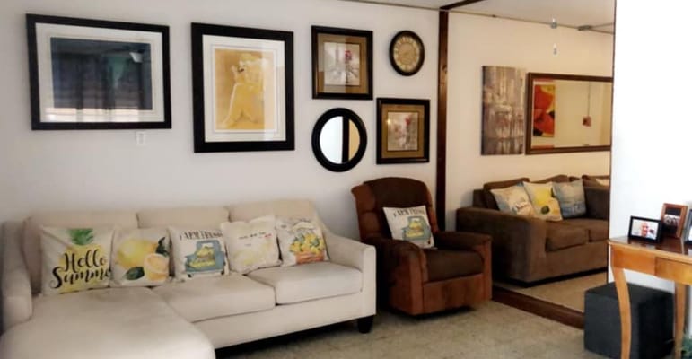 Cozy lounge area with comfortable seating and decor