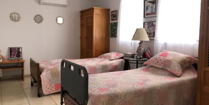 Interior view of a resident room with twin beds