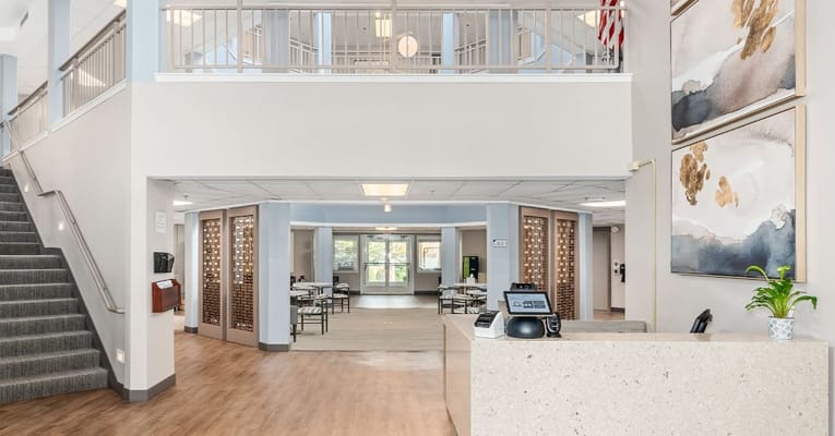 Bright interior lobby with seating and decor