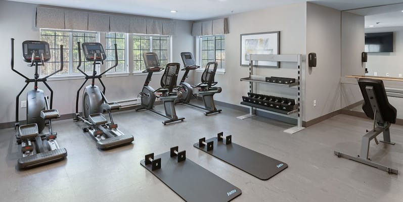 Interior view of a fitness room with exercise equipment
