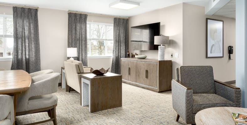 Bright common area with comfortable seating and natural light