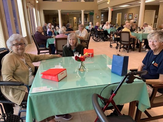 Residents enjoying a social gathering in a common area