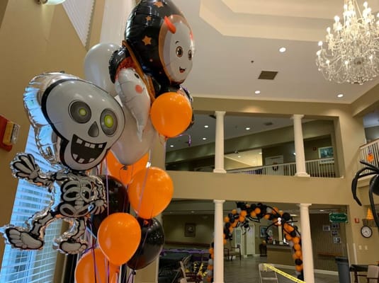 Decorative balloons for a festive event in a common area