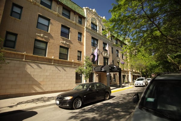 Exterior view of the facility building with entrance