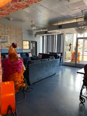 Cozy living room with blue sofas and decorative accents