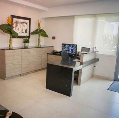Reception area with modern decor and plants