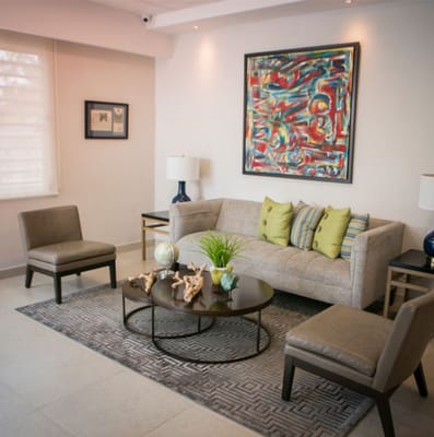 Bright lounge area with modern furniture and artwork