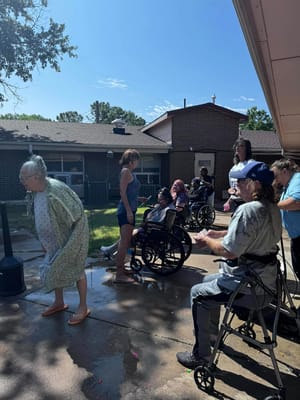 Residents participating in an outdoor water activity
