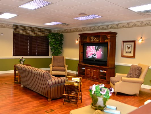 Cozy common area with seating and a television