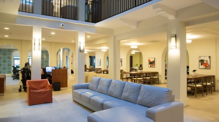 Modern common area with seating and dining space