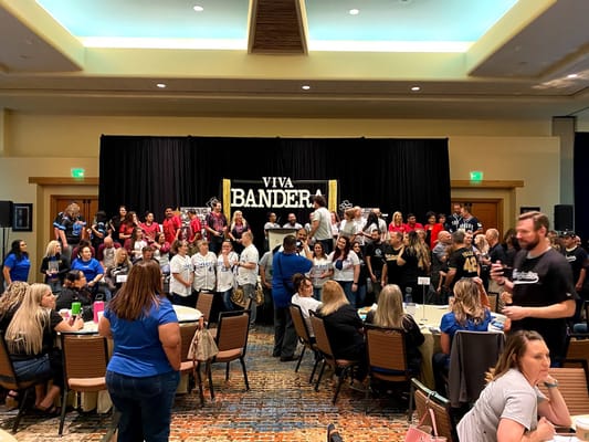 Residents and staff celebrating during an event