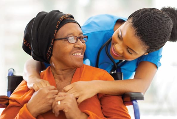 Nurse interacting with a senior resident in a care facility