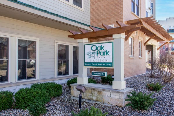 Sign of Oak Park Place Madison East at the building entrance