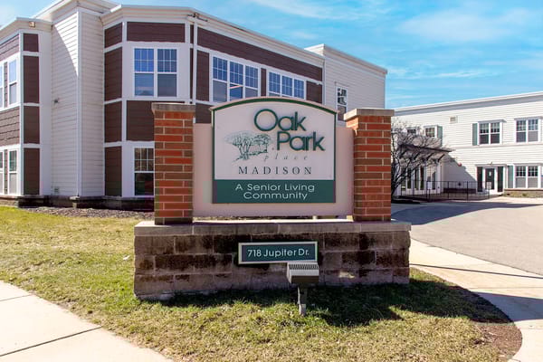 Sign for Oak Park Place Madison East senior living community