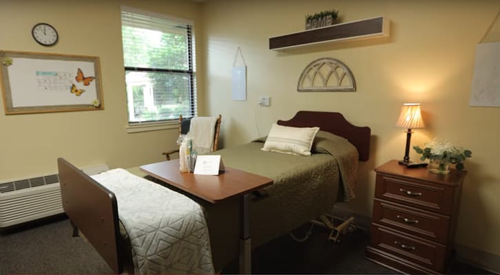 Cozy resident room with bed and decorations