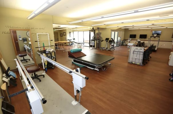 Interior of a rehabilitation therapy room with equipment