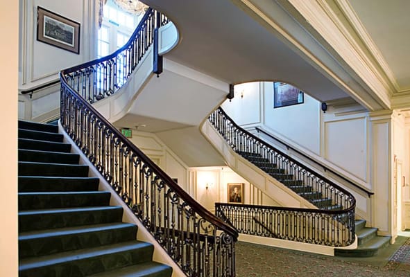 Elegant interior staircase in a retirement facility