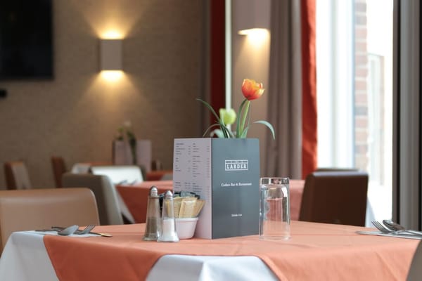 Dining table set in a restaurant-style dining area